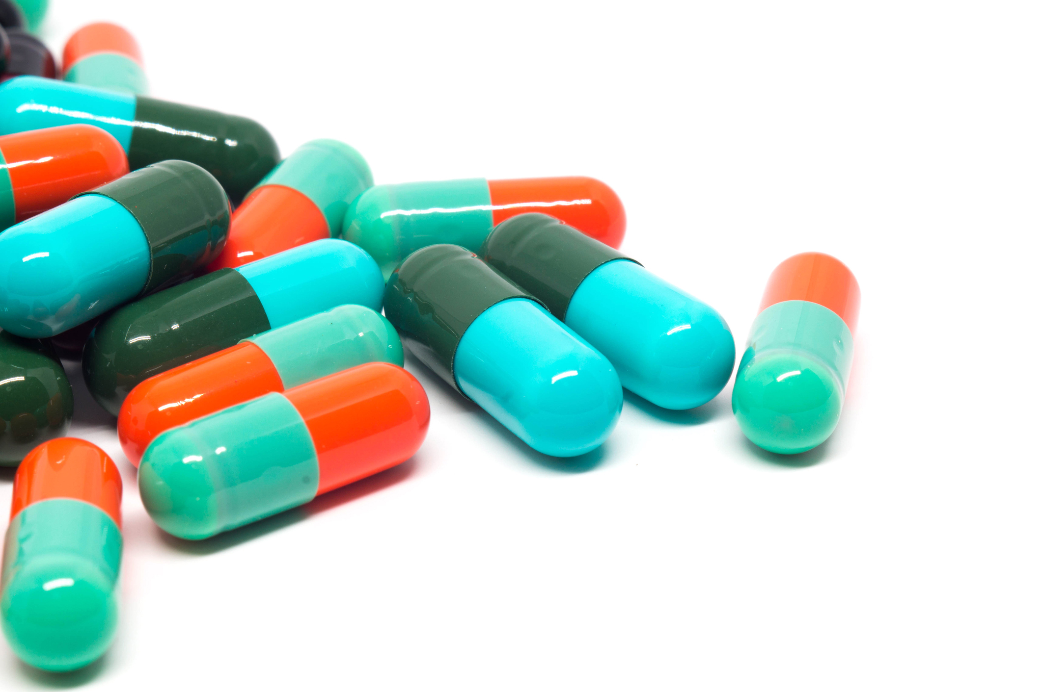 colorful gelatin pills capsules on white background